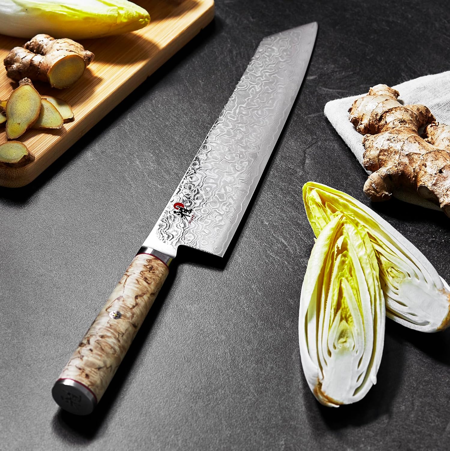 Miyabi Birchwood SG2 Karelian birch handle and red spacer detail