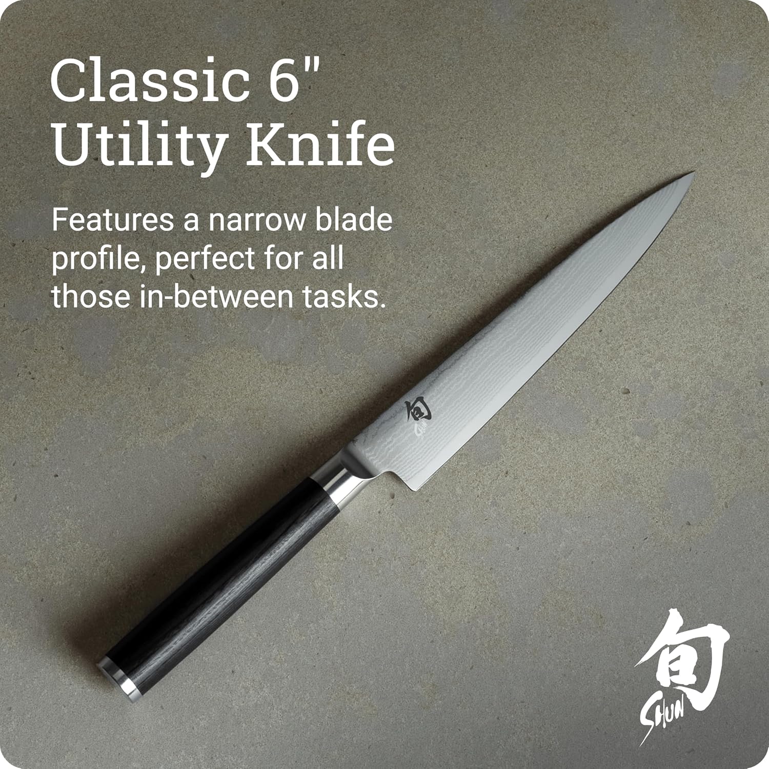Shun Classic narrow Damascus blade and D-shaped Pakkawood handle
