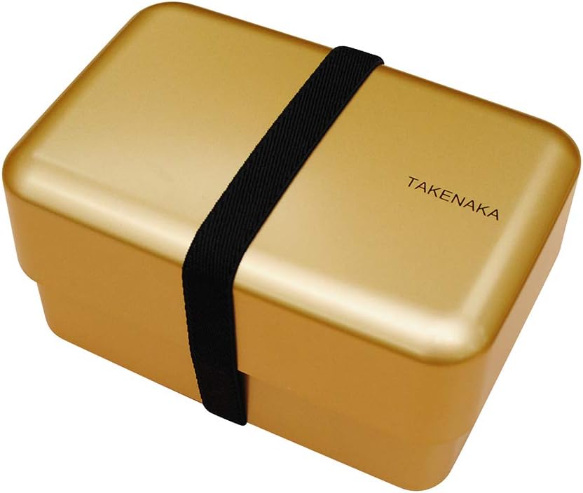 Takenaka Bento Nibble Box with its black elastic band closed for transport