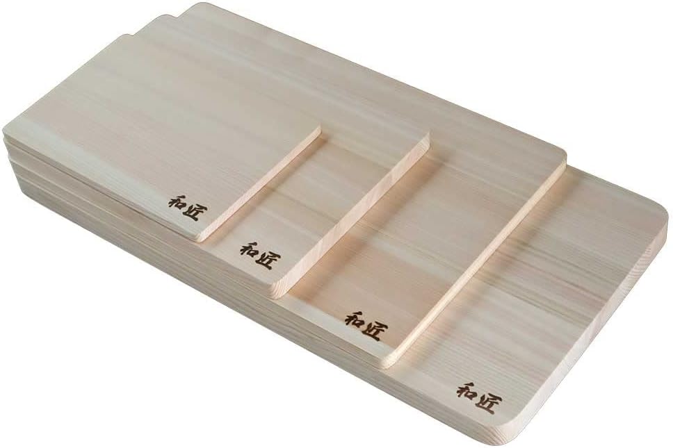 Four WASHO hinoki cutting boards stacked to show the small, medium, large and extra large sizes