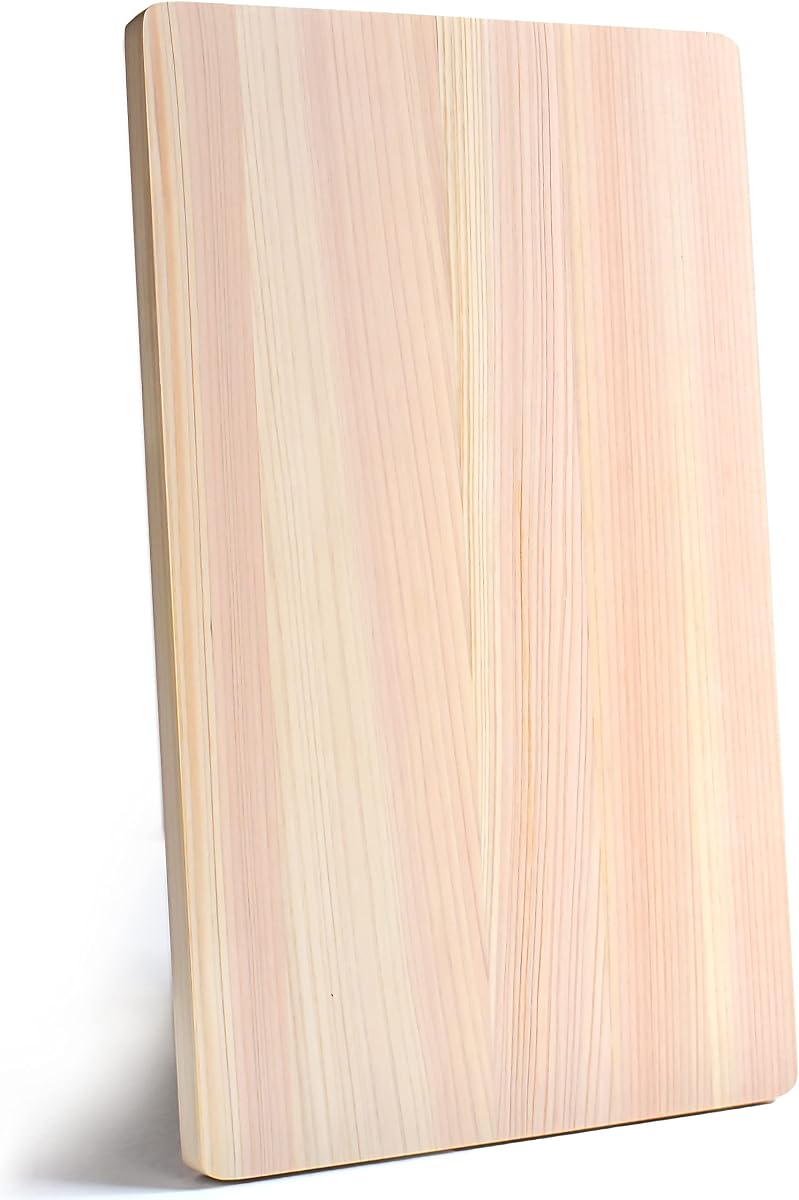 YAMASAN Kyoto Uji hinoki cutting board standing upright on a white background