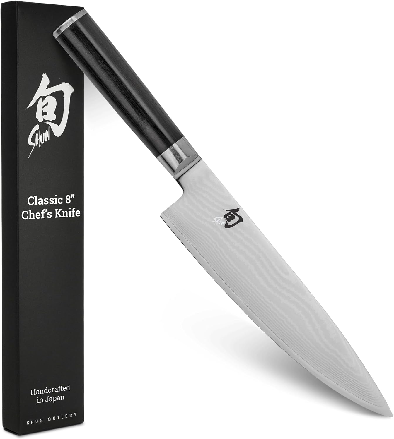 Shun Classic 8-inch chef's knife with its retail box, black PakkaWood handle and Damascus blade