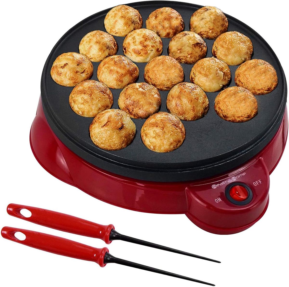 Health and Home red electric takoyaki maker filled with browned octopus balls and two turning picks
