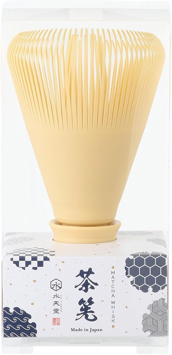 SUITENDO cream-coloured resin matcha whisk in a clear box whose label reads Made in Japan