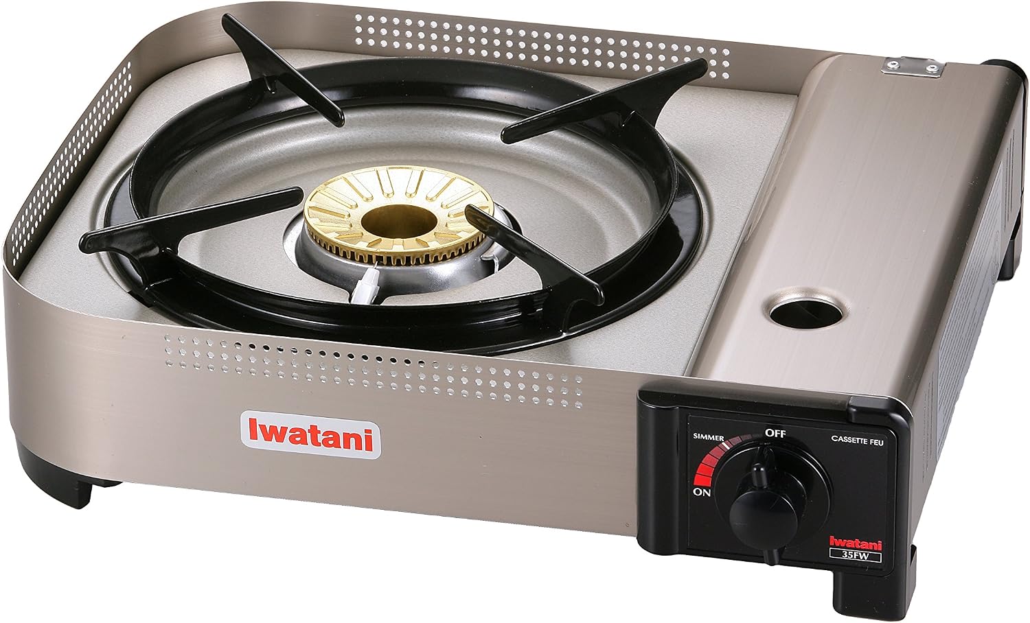 Iwatani 35FW butane stove seen from above showing the brass burner ring, black trivet arms plus the red control knob
