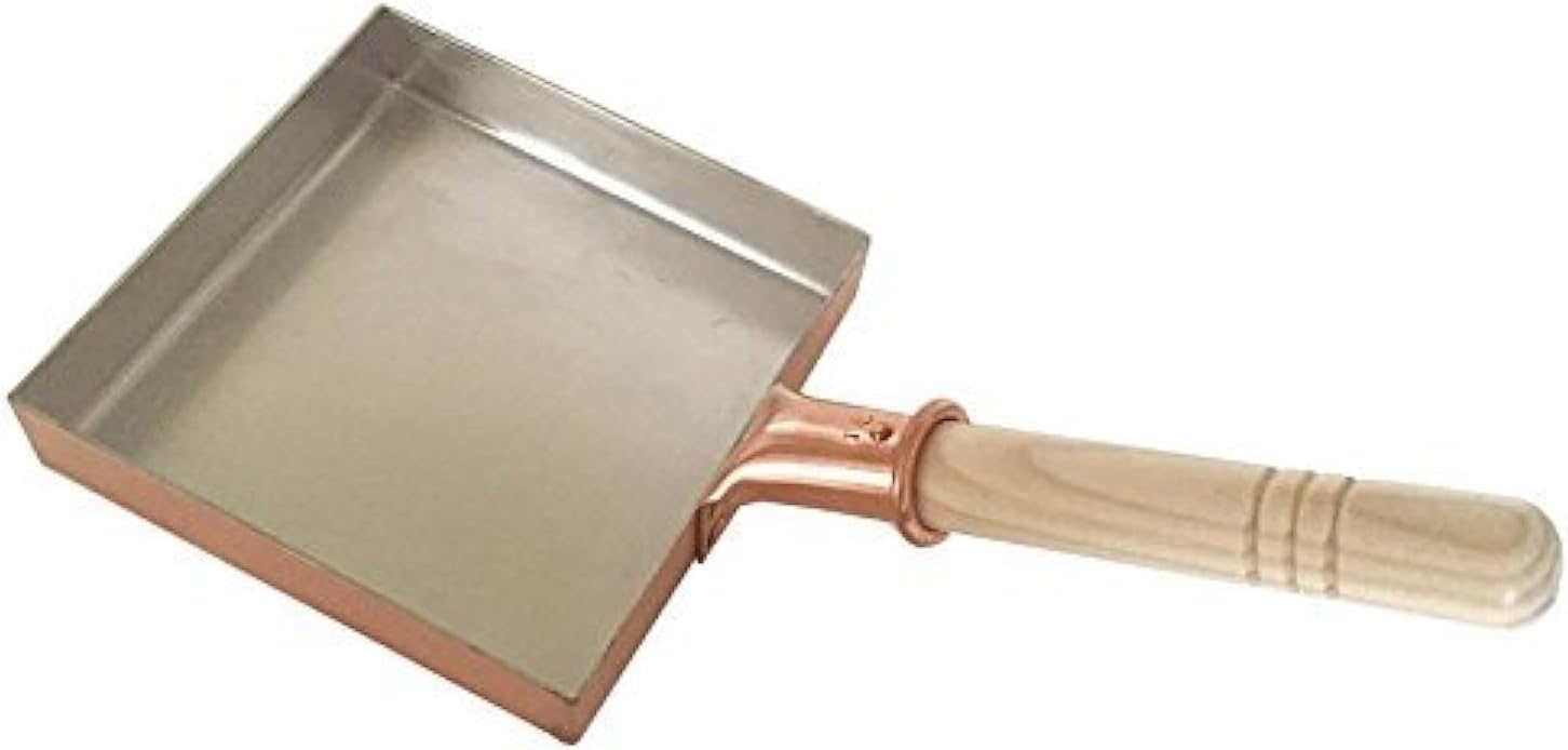 Nakamura Douki copper tamagoyaki pan with a silver tin-lined interior and a plain wooden handle