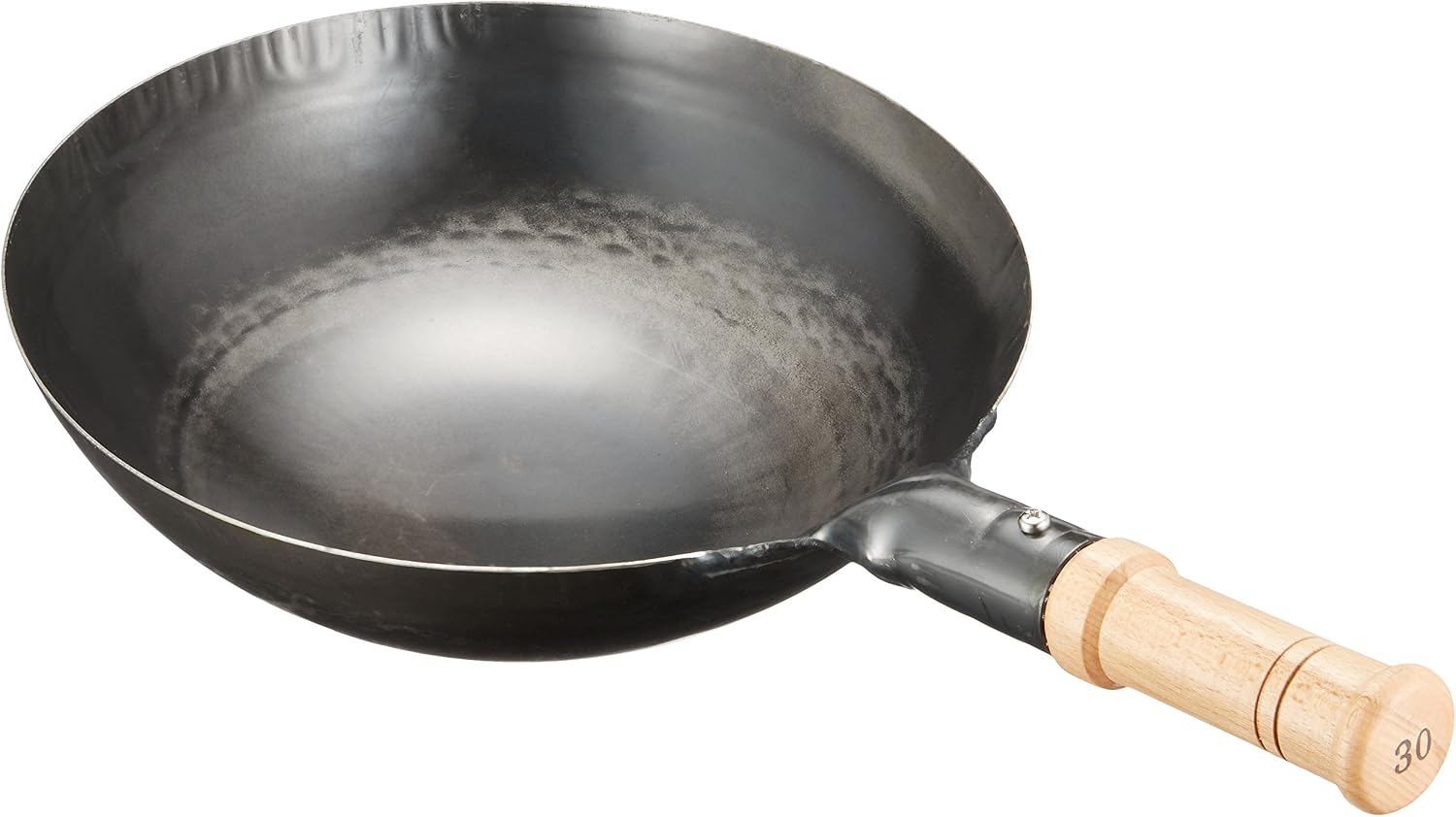 Inside of a Yamada Kogyosho wok showing the fine hammer texture on the iron surface