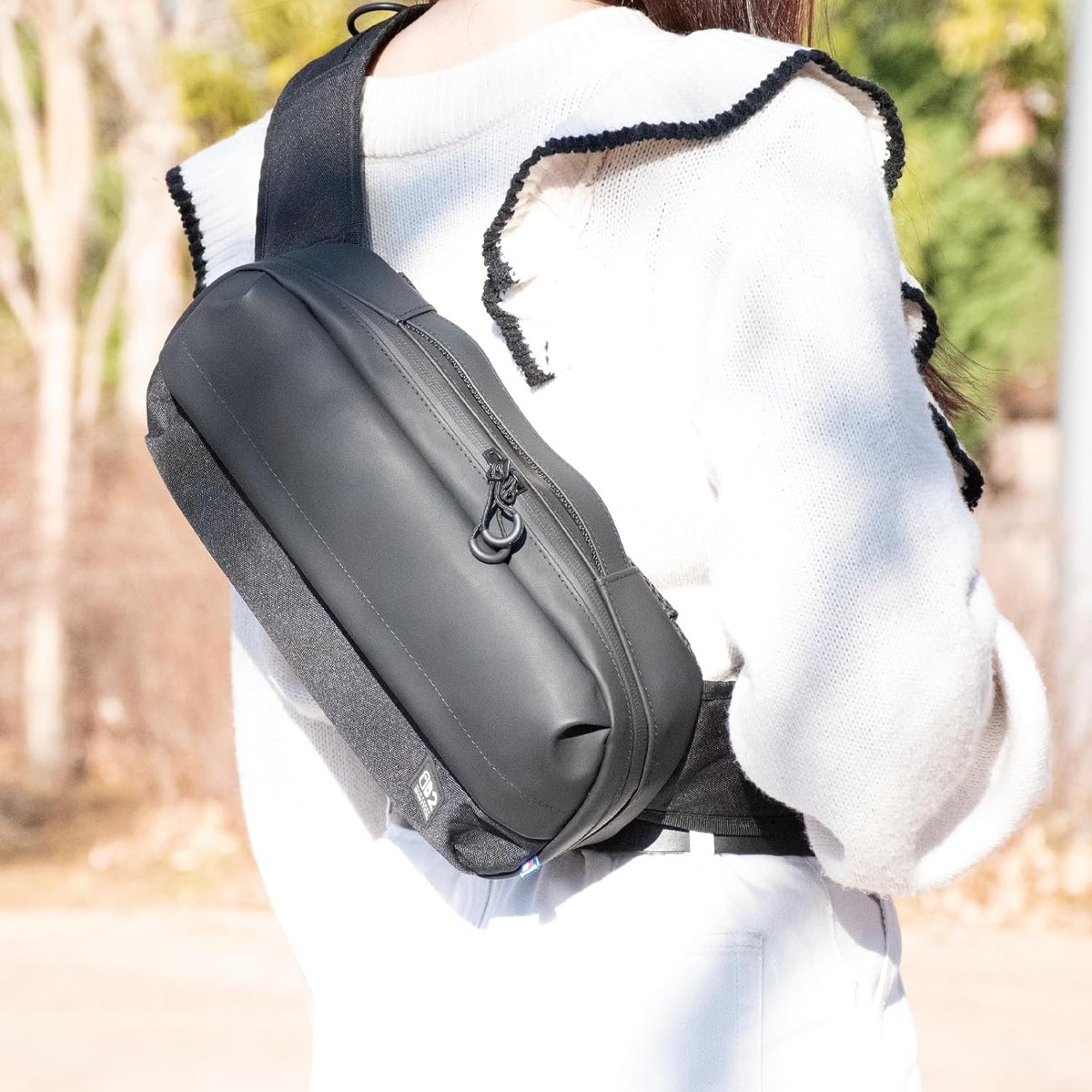 HORI Adventure Pack worn as a cross-body bag