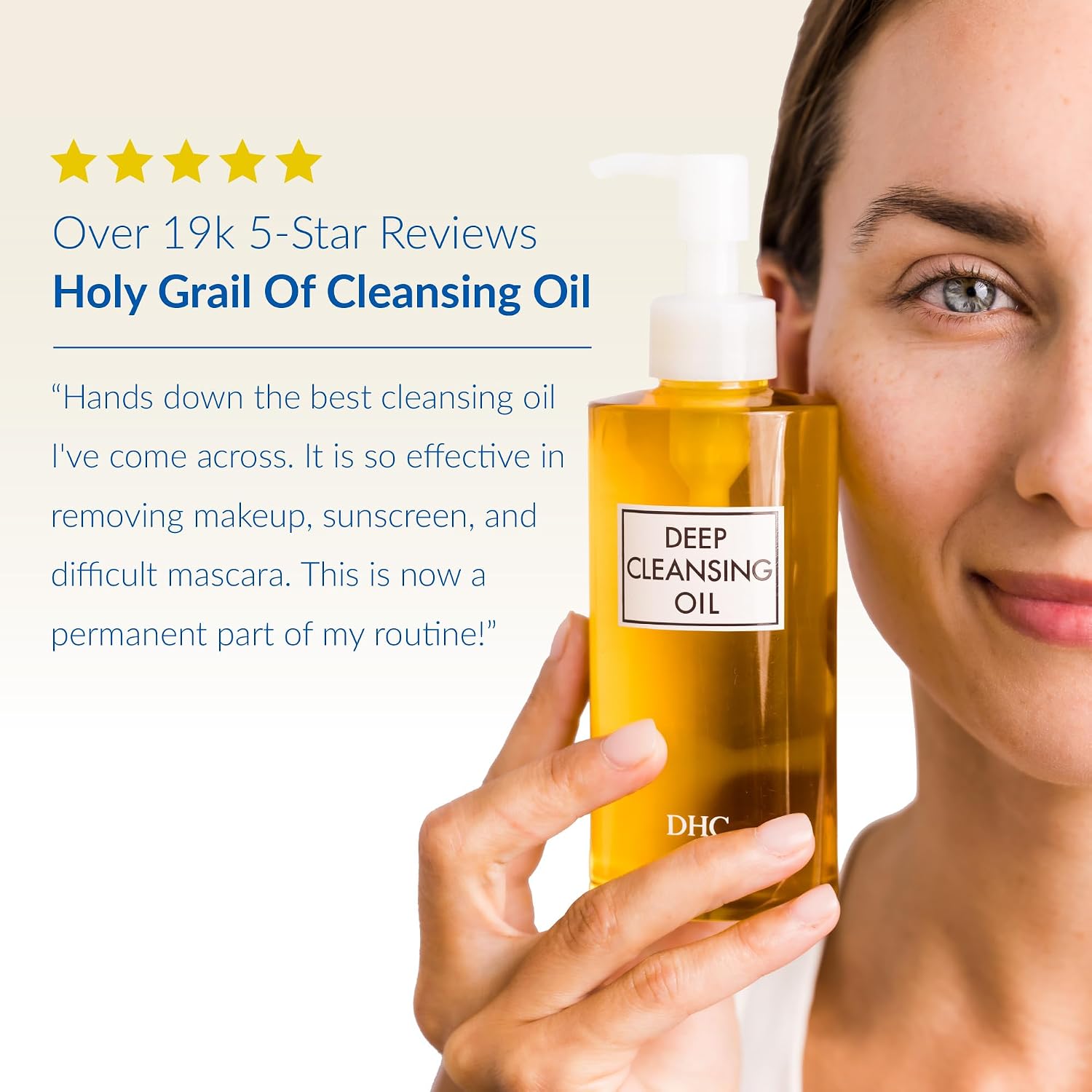 Woman holding a bottle of DHC Deep Cleansing Oil next to her face