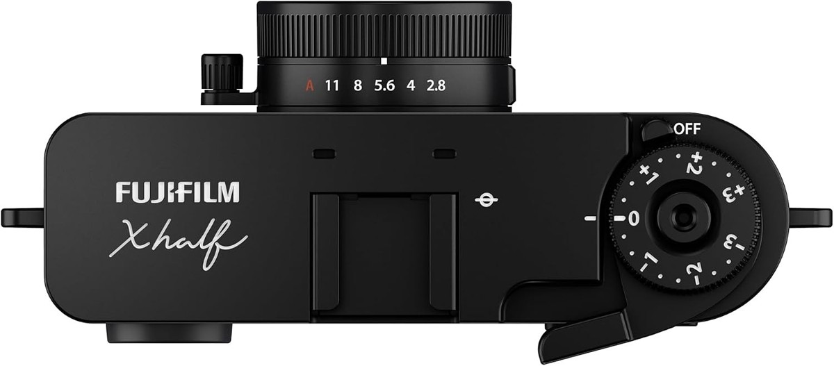 Top plate of the Fujifilm X half showing the dial and lever