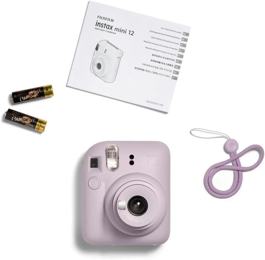 instax mini 12 box contents: camera, strap, manual and two AA batteries