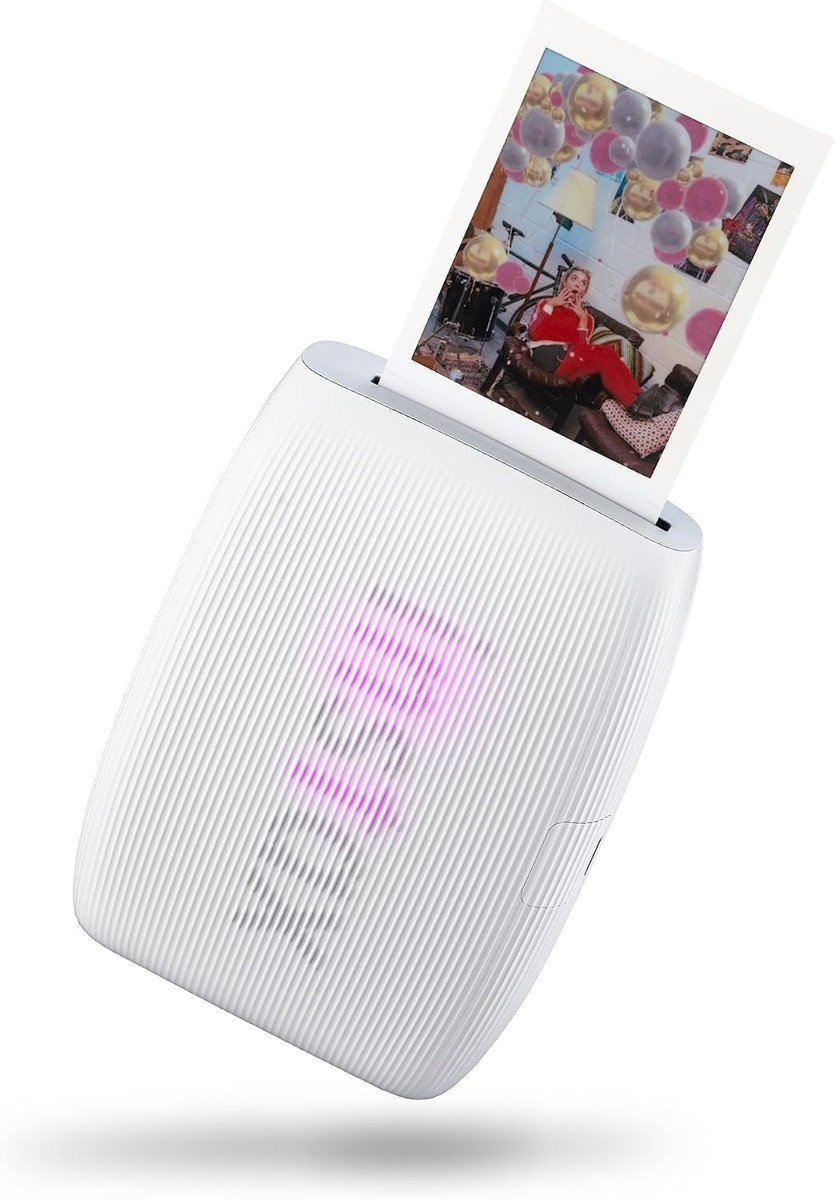 instax mini Link 3 smartphone printer in Clay White printing a photo