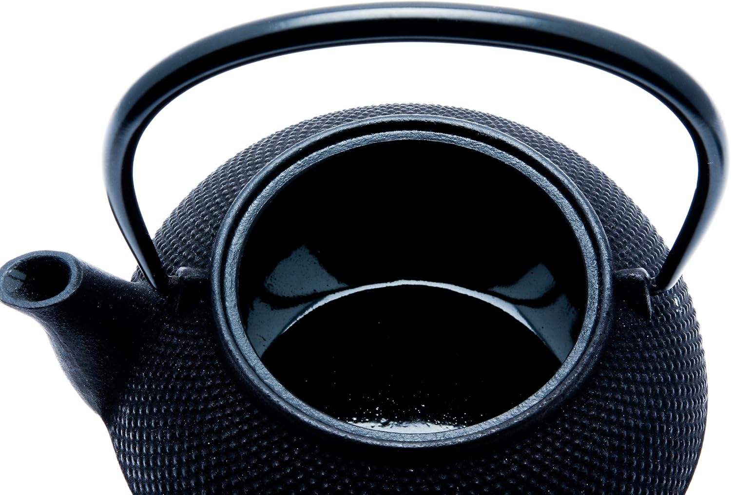 Open Iwachu hobnail teapot showing the black enamel-coated interior