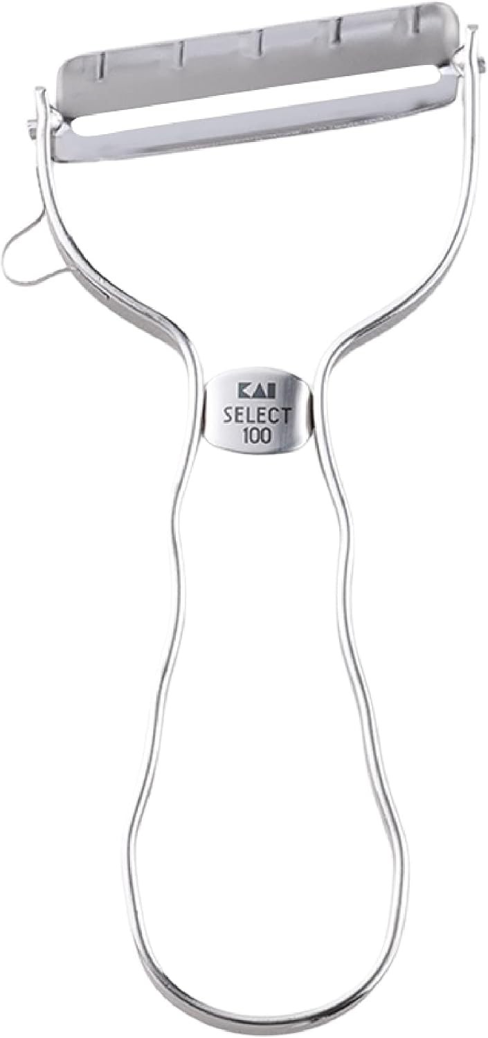 Kai Select 100 T-peeler DH3000 in brushed stainless steel with a wave-shaped handle