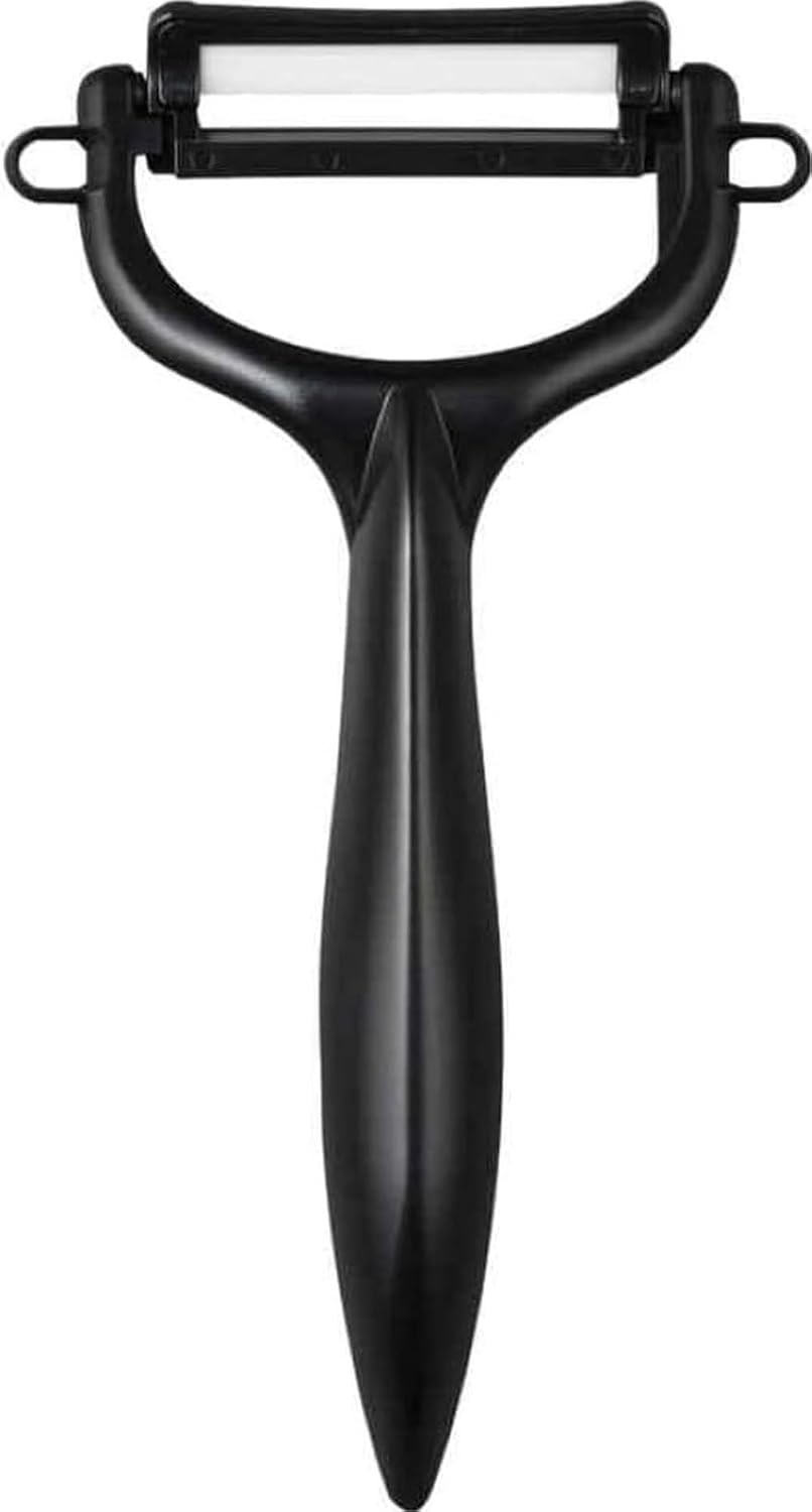 Kyocera ceramic peeler with a white ceramic blade and black handle