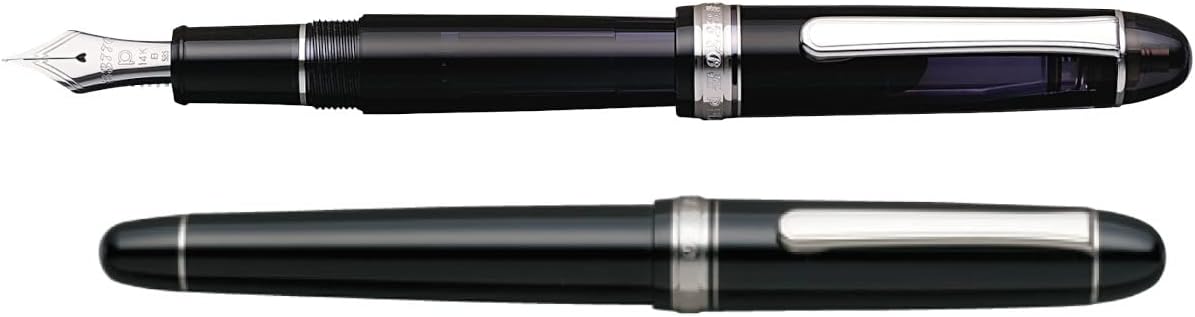 Two black 3776 Century Rhodium pens with silver-tone trim, one capped