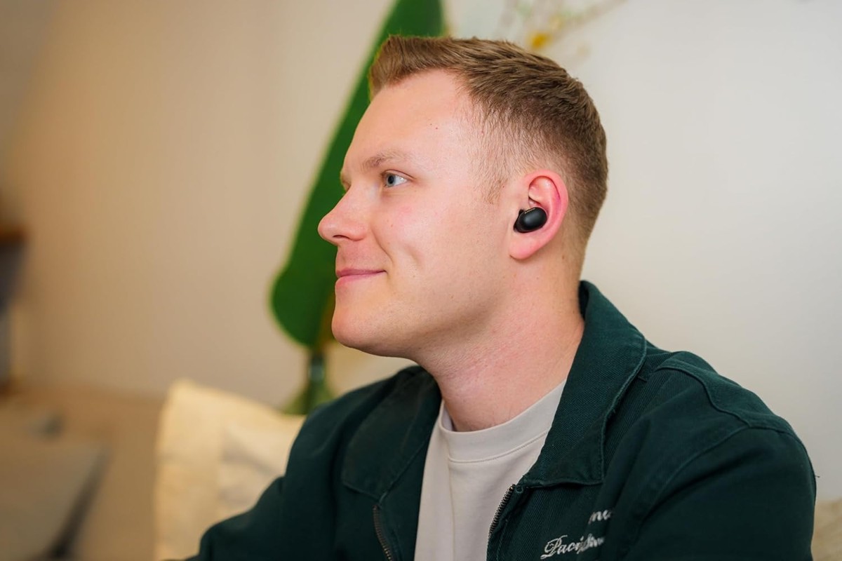 Man wearing a Sony WF-1000XM6 earbud